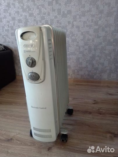 Масляный обогреватель
