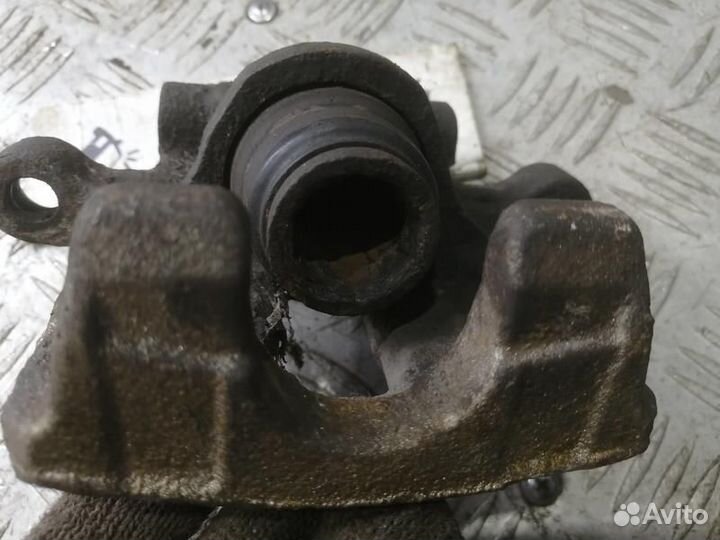 Суппорт задний правый Mitsubishi Lancer X