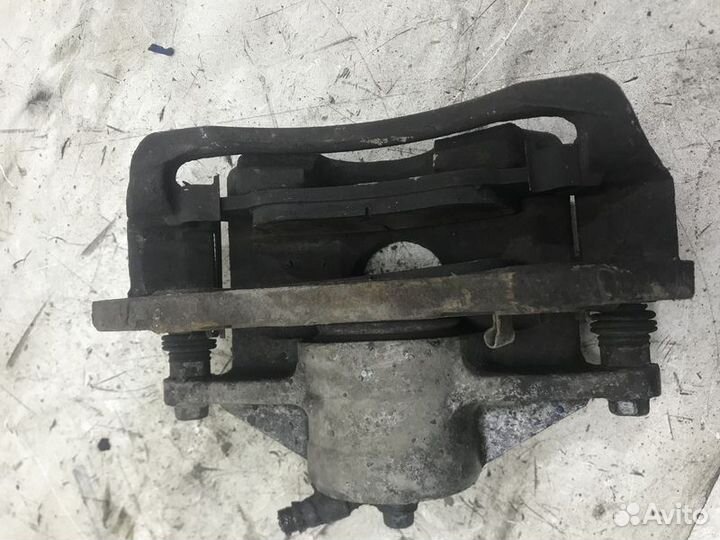 Суппорт тормозной передний правый Kia Cerato