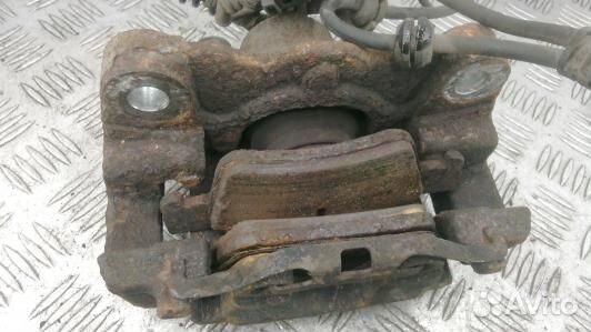 Суппорт тормозной задний левый volkswagen touareg