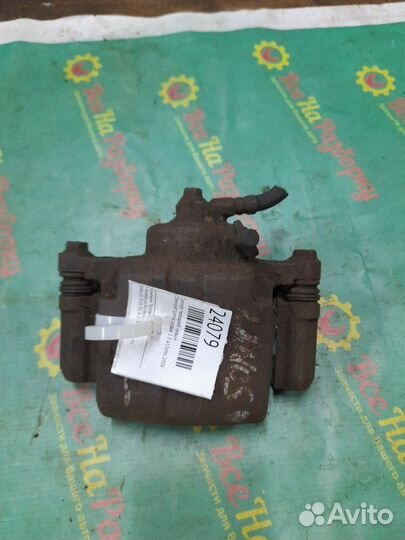 Суппорт передний левый Chevrolet Lanos седан 1.5