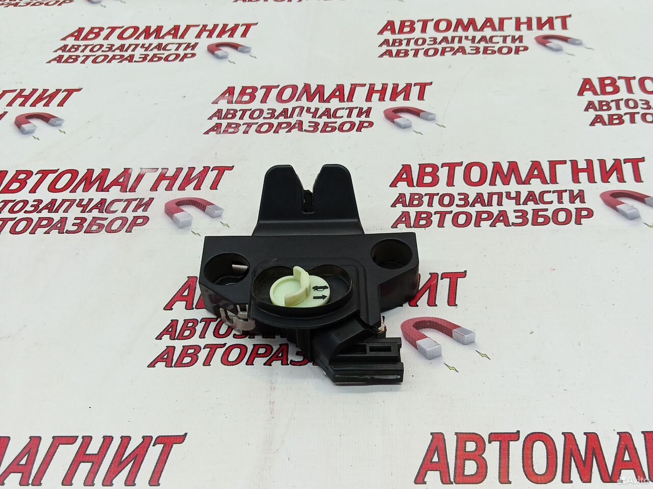 Замок крышки багажника Джили Эмгранд SS11