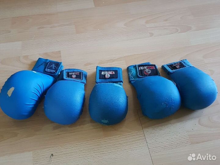 Перчатки и фунты для занятий единоборствами