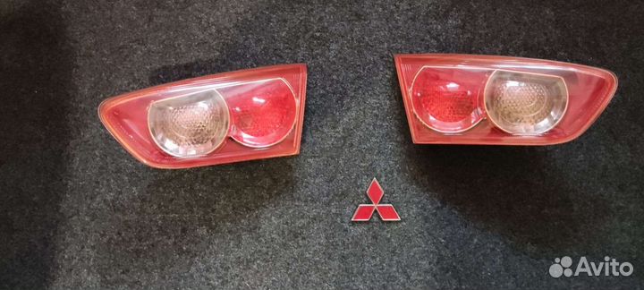 Фонарь в крышку багажника Mitsubishi Lancer X