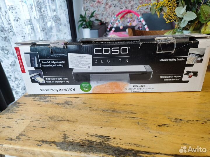 Вакуумный упаковщик