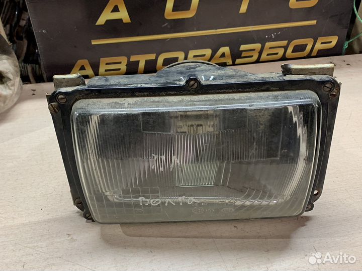 Фара левая волга 3102