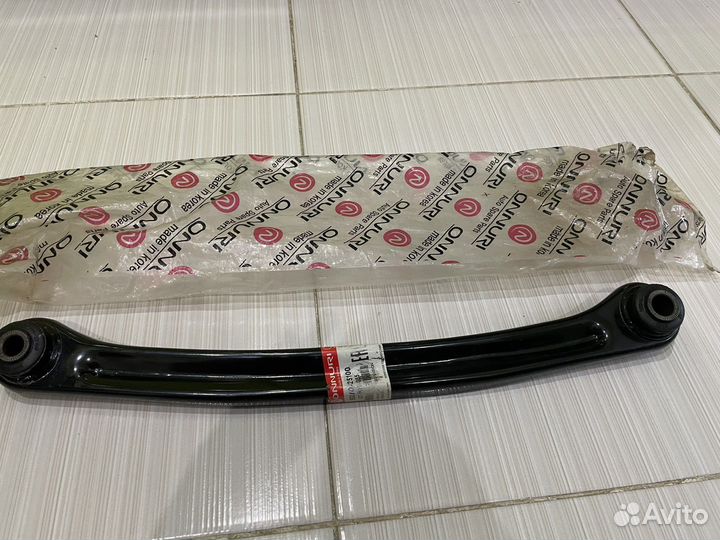 Задний левый рычаг Хендай accent