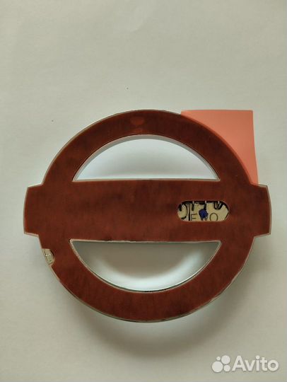 Эмблема Nissan