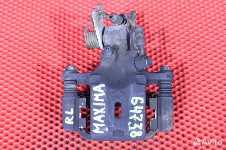 Суппорт тормозной задний левый Nissan Cefiro GF-WA