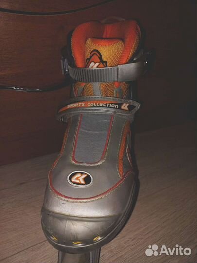 Роликовые коньки