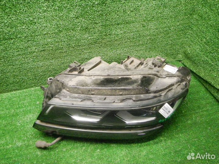 Фара левая Volkswagen Tiguan