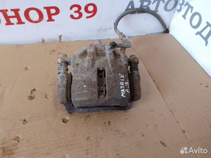 Суппорт тормозной передний левый Hyundai Matrix