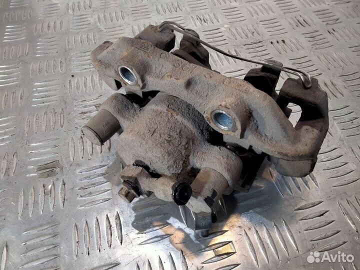 Суппорт левый Опель Вектра б