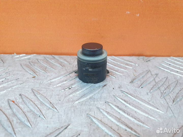 Датчик парктроника передний Toyota Corolla 11 E160