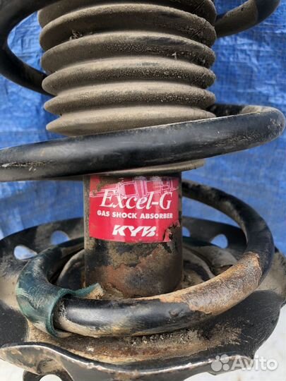 Амортизатор передний левый Opel Astra h