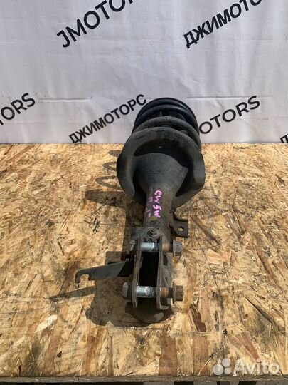 Амортизатор передний левый Mitsubishi Outlander Xl