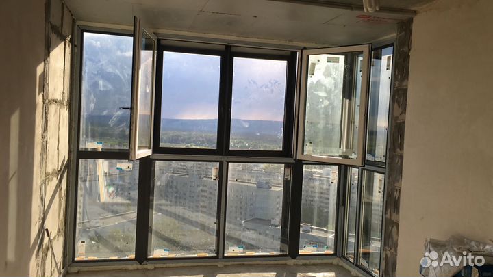 Окна на балкон от компаний Окна-тат