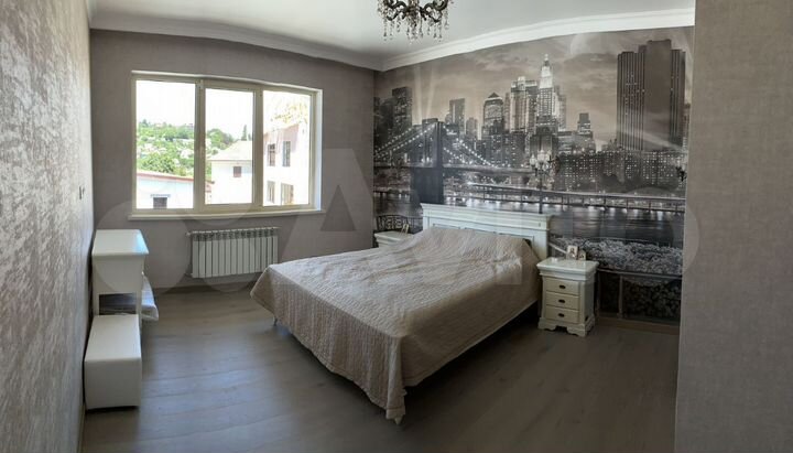 Коттедж 308 м² на участке 9 сот.