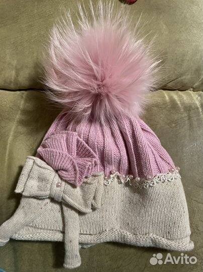 Дорогая шапка с натуральным бумбоном