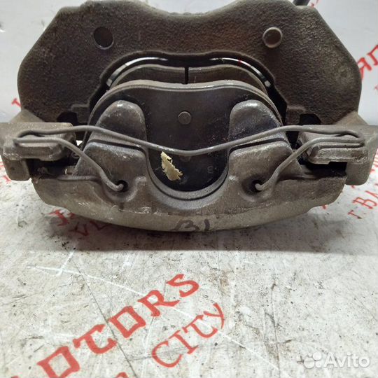 Суппорт тормозной передний правый Mazda 3 BL