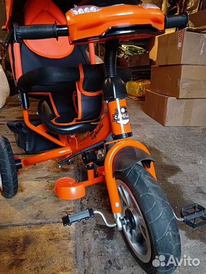 Трехколесный велосипед с ручкой