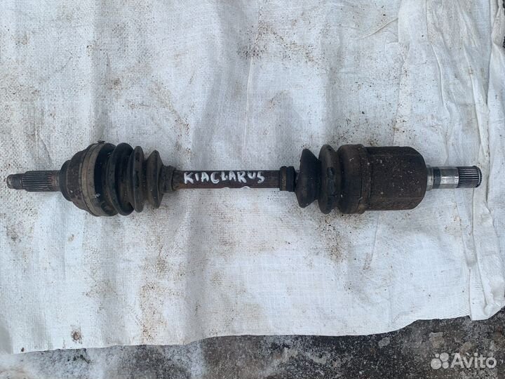 Привод левый Киа Кларус