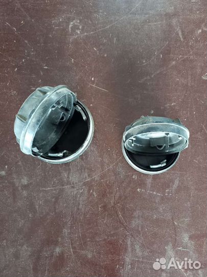 Колпачки на фары. Рено лагуна-2