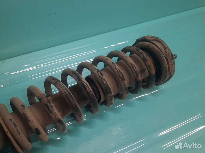 Стойка амортизатора передняя левая rover 400