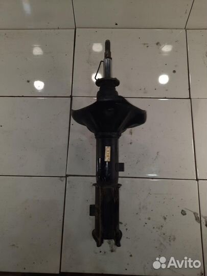 Амортизатор передний левый Hyundai Accent 2 (LC, T