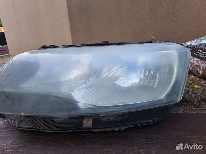 Фара левая Skoda Rapid