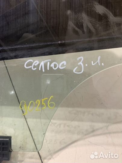 Стекло двери (заднее левое) (Kia Seltos)