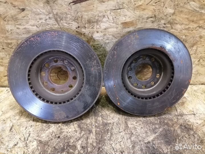 Диск тормозной передний Volkswagen Passat B6