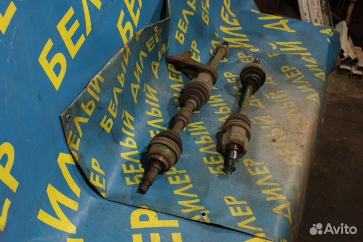 Передняя полуось + промвал Mazda 323F BA