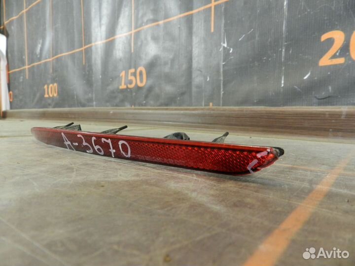 Отражатель бампера заднего левый - Opel Astra J