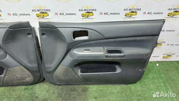 Обшивки дверей передние Lancer 9
