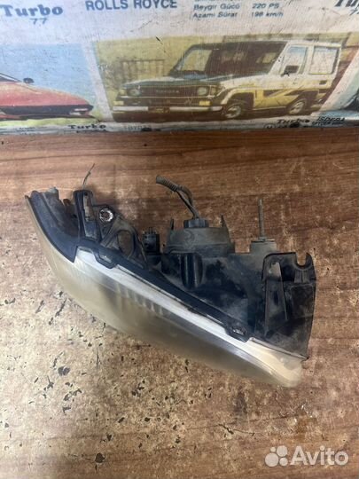 Фара правая оригинал Мазда Трибьют