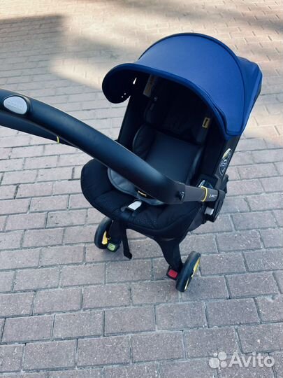 Коляска автокресло doona с базой isofix