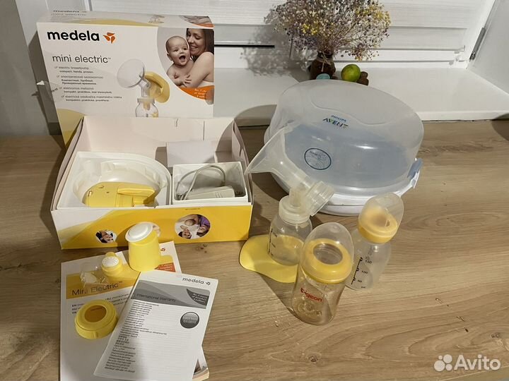 Молокоотсос medela электрический