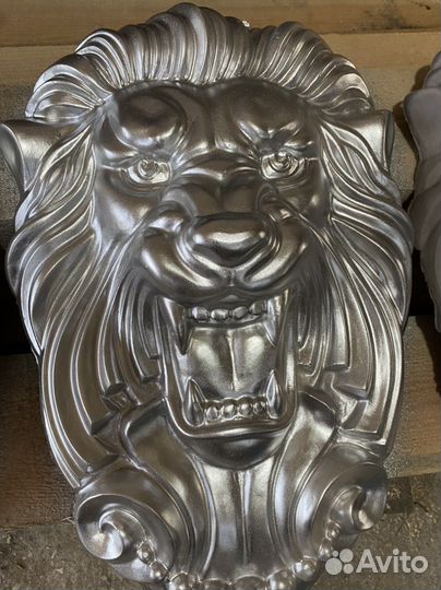 Барельеф лев