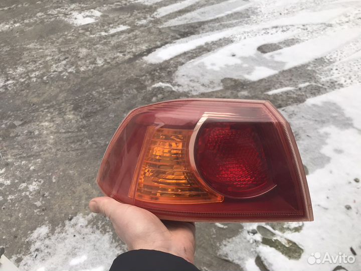 Фонарь задний левый mitsubishi lancer 10