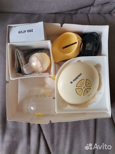 Молокоотсос электрический medela