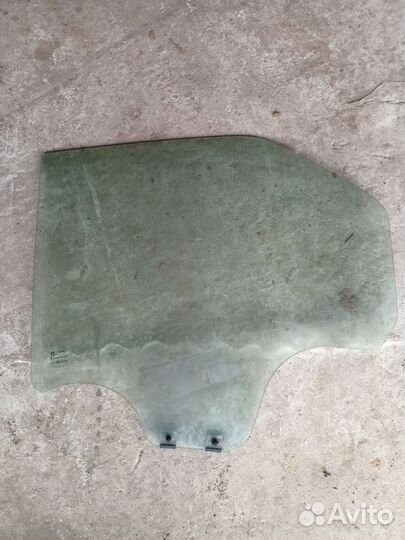 Стекло двери заднее левое renault logan 1