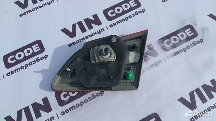 Фонарь в крышку багажника левый Nissan Almera 3