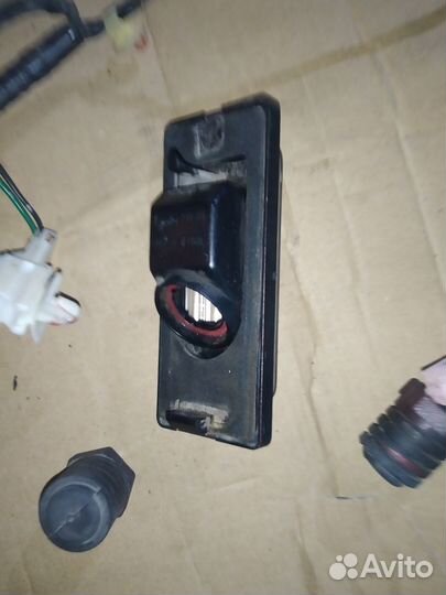 Фонарь подсветки номера Mitsubishi Galant 8