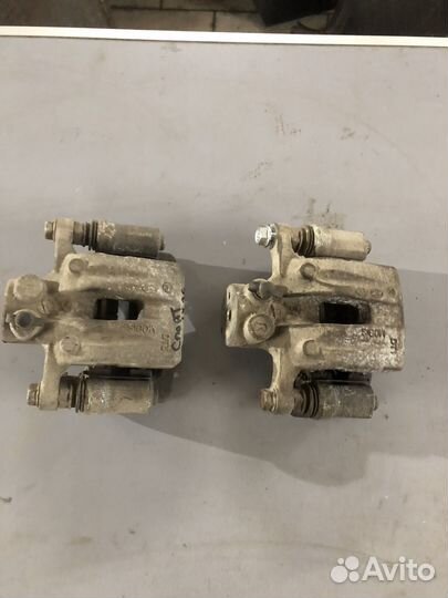 Суппорт Тормозной задний Спрптейдж 3,ix35