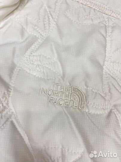 The north face жилетка