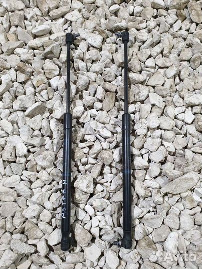 Амортизатор багажника Opel Astra H