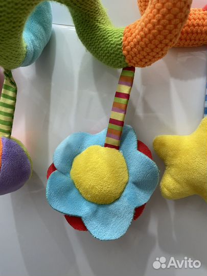 Дуга с игрушками на коляску