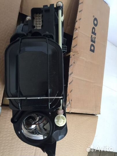 Левая Фара VW touareg 03-07 с электро корректором