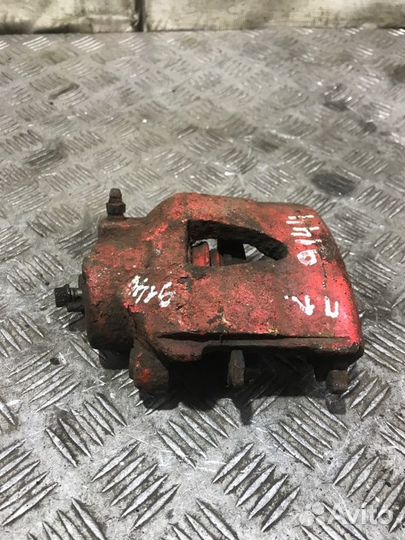 Суппорт тормозной передний левый Volkswagen Golf 4